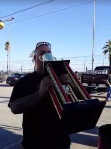 Ryan Thacker drinking from Hotchkis Cup